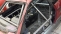Huezo Racing custom fabricated 6-point roll cage with anti-intrusion doors on 1987 PONTIAC FIERO