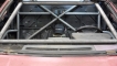Huezo Racing custom fabricated 6-point roll cage with anti-intrusion doors on 1987 PONTIAC FIERO